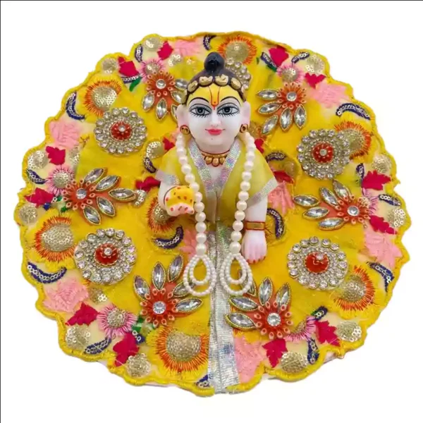 Laddu Gopal Dress with designer embroidery work and heavy stone embellishments for Janmashtami from Vrindavan Puja Store.